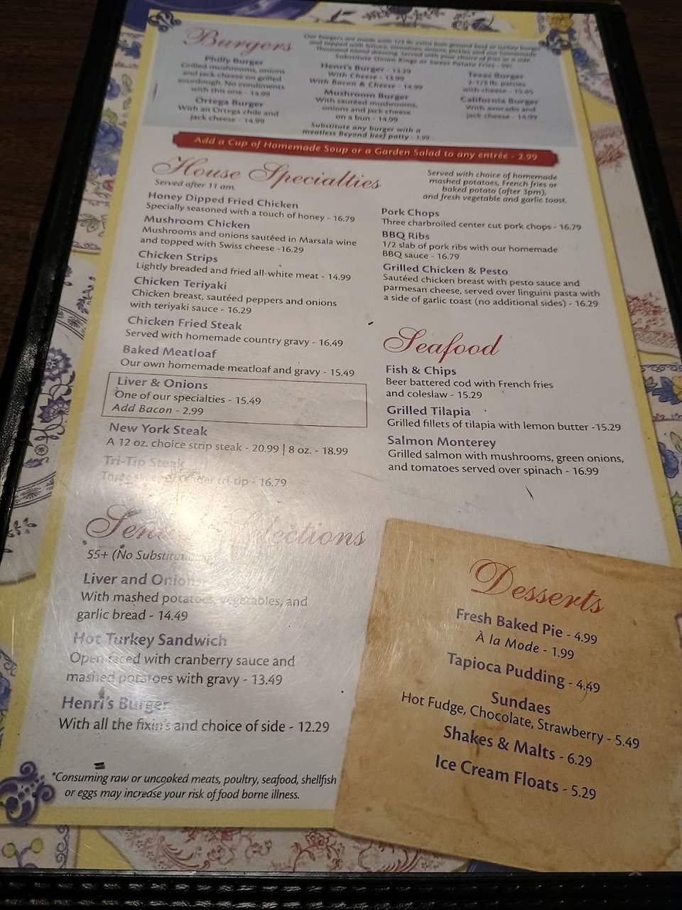 Printed menu featuring eggs, toast, and coffee.